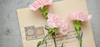 pink flowers on letter
