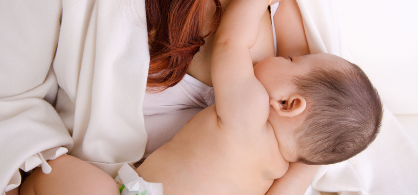 Woman Breastfeeding Baby
